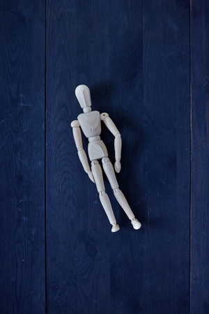 A studio photo of a wooden toy mannequinの写真素材
