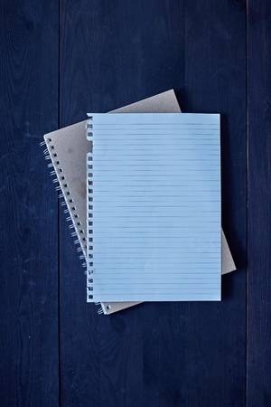 A studio photo of a note book padの写真素材