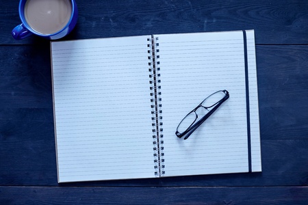 A studio photo of a note book padの写真素材