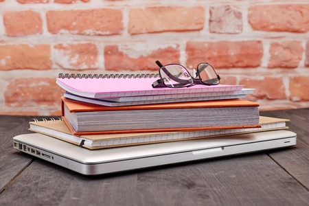 A studio photo of a note book padの写真素材