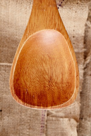 A studio photo of a wooden spoonの写真素材