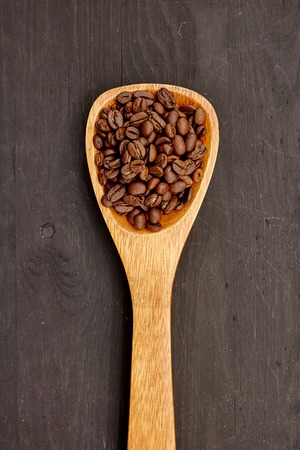A close up studio photo of roasted coffee beansの写真素材