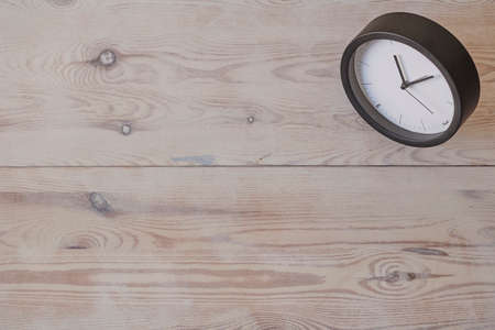 A studio photo of a desk clockの写真素材