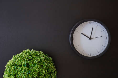 A studio photo of a desk clockの写真素材
