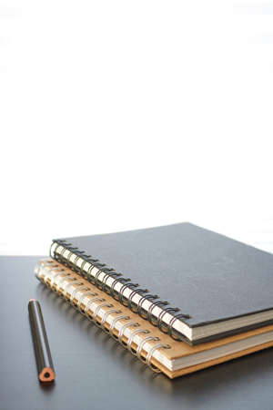 A studio photo of a note bookの写真素材
