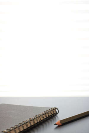 A studio photo of a desk clockの写真素材