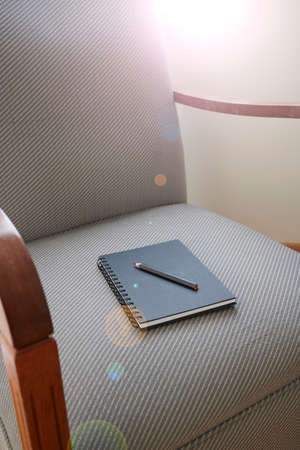 A studio photo of a blank note bookの写真素材