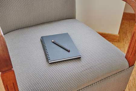 A studio photo of a blank note bookの写真素材