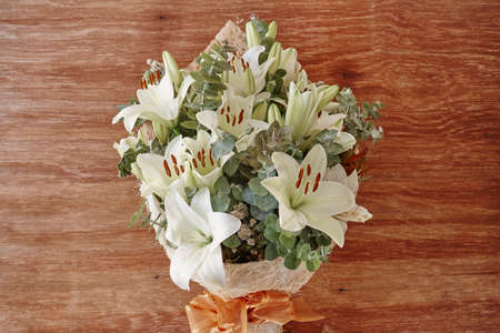 A studio photo of a bouquet of flowersの写真素材