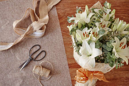 A studio photo of a bouquet of flowersの写真素材