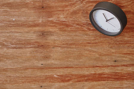 A studio photo of a desk clockの写真素材