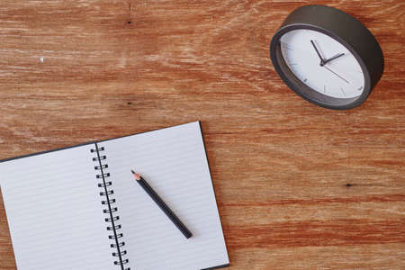 A studio photo of a desk clockの写真素材