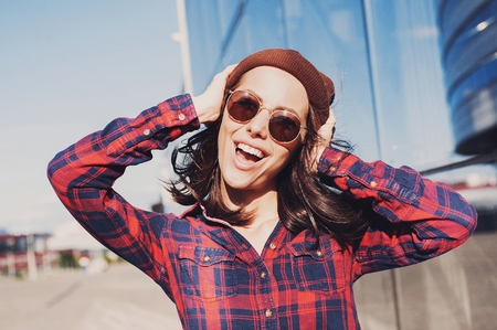 Emotional joyful young woman. Happy surprised girl portraitの写真素材