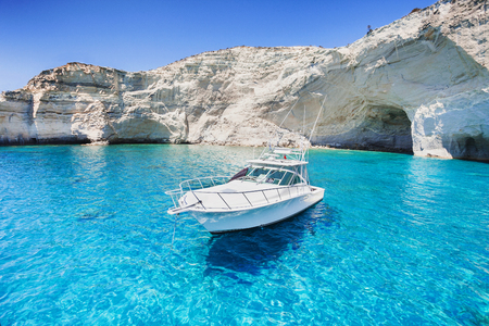 Sailboat in a beautiful bay, Milos island, Greeceの写真素材