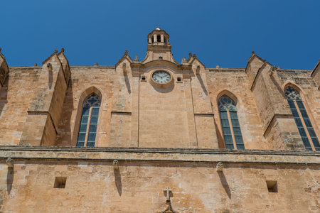 Facade of a christian church with clockの写真素材