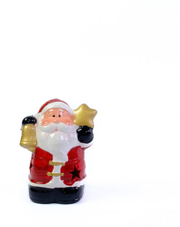 Santa Claus figurine, doll on white background.の写真素材