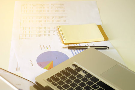 document financial accounting on office accountant desk with sun lightの写真素材