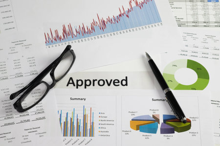 Document approved  with business backgroundの写真素材