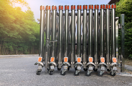 Folding gate on ground floor with sunlightの写真素材