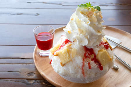 back side of thoughtful child girl on white background. Hold pen writing on blank  space text.の写真素材