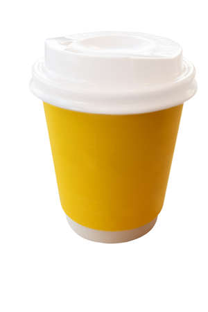 Yellow paper cup wish copies space for hot or warm beverageの写真素材
