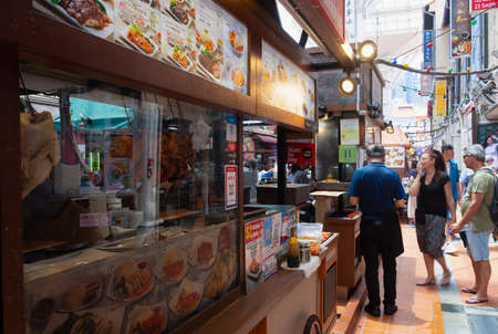 SINGAPORE - April 8, 2019: Singapore Chinatown, Food street style dining authentic food.のeditorial素材
