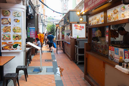 SINGAPORE - April 8, 2019: Singapore Chinatown, Food street style dining authentic food.のeditorial素材