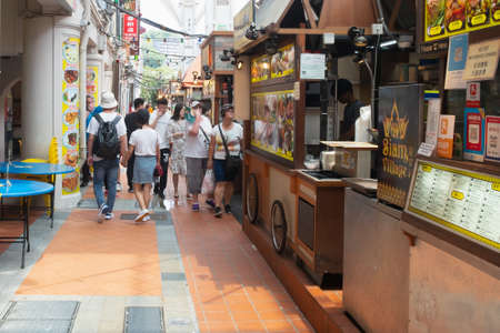 SINGAPORE - April 8, 2019: Singapore Chinatown, Many people or tourists are walking food street chiness market or street style authentic food.のeditorial素材
