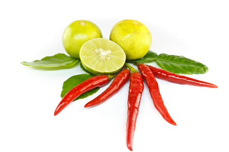Chilli, lemon and kaffir lime leaves on white backgroundの写真素材