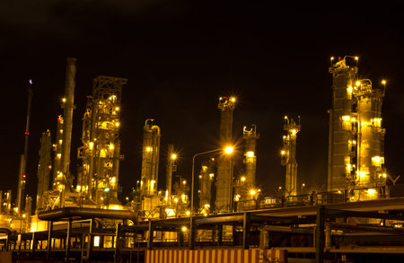 Oil refinery in full operation during the nightのeditorial素材