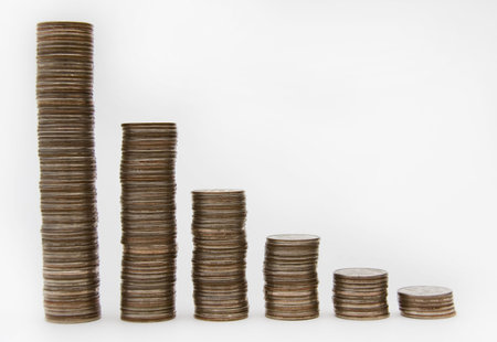 Columns of Coins against the Light Background