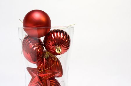 Red christmas balls in glass vaseの写真素材