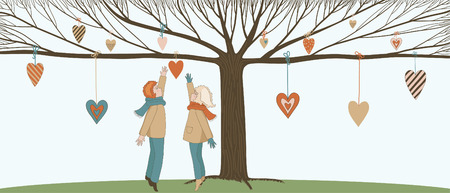 Boy and girl under Love tree with hanging heartsのイラスト素材