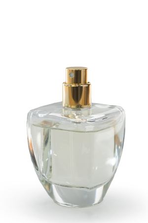 Glass perfume bottle on white background, gold capの写真素材