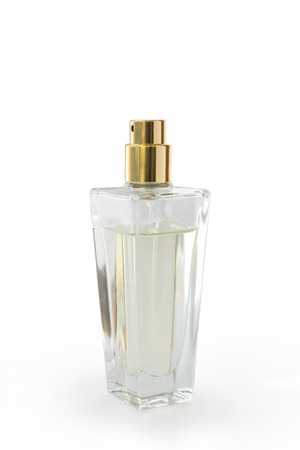 Glass perfume bottle on white background, gold capの写真素材
