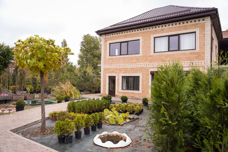 Brick house backyard in late autumnの写真素材