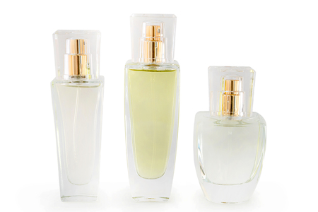 Three glass perfume bottle on white backgroundの写真素材