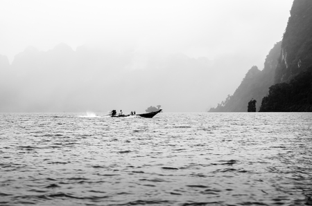Boat on Lake at Ratchaprapa damの写真素材