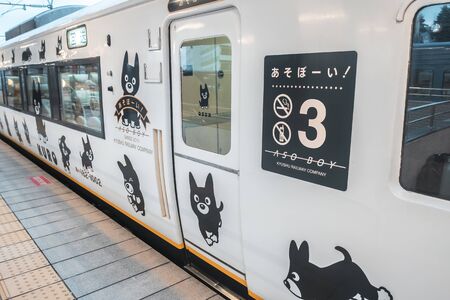 Aso, Kyushu, Japan - October 14, 2018 :Aso boy JR train, limited express train, route between Higo-Ozu station and Aso stationのeditorial素材