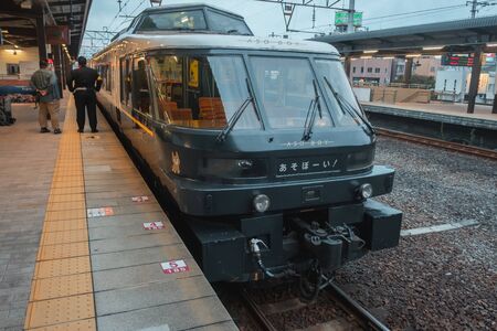 Aso,Kyushu,Japan - October 14, 2018 :Aso boy JR train, limited express train, route between Higo-Ozu station and Aso stationのeditorial素材