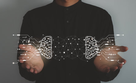 Digital information technology concept. Businessman holding artificial intelligence icon.の写真素材