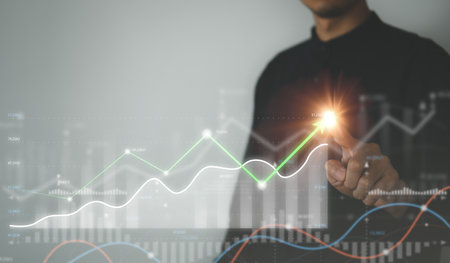 Business man and Financial Charts. Financial and Economic concept. Stock market and Cryptocurrency graph.の写真素材