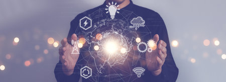 Digital information technology concept. Businessman holding virtual earth hologram. Social network, Digital marketing, Network transmission, Computer science and financial, artificial intelligence.の写真素材