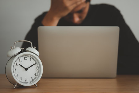 Time managment concept. The stress business man and  clock . Work management.の写真素材