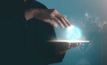 Digital information technology concept. Businessman holding virtual earth hologram. Social network, Digital marketing, Network transmission, Computer science and financial, artificial intelligence.の写真素材