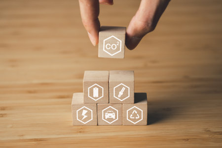 Wooden block of CO2 emission reduction icons. environment, global warming, CO2, sustainable energy concept.の写真素材