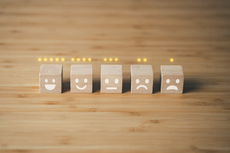 Wooden block of survey rating icon for customer satisfaction scores. customer satisfaction concept.の写真素材