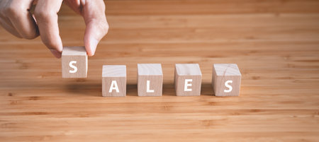 Wooden block with text SALES. business and sale marketing concept.の写真素材
