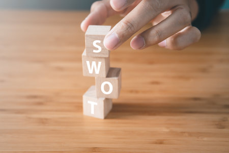 Wooden block of SWOT analysisl. Strengths, Weaknesses, Opportunities, and Threats. Business strategy  tool concept.の写真素材