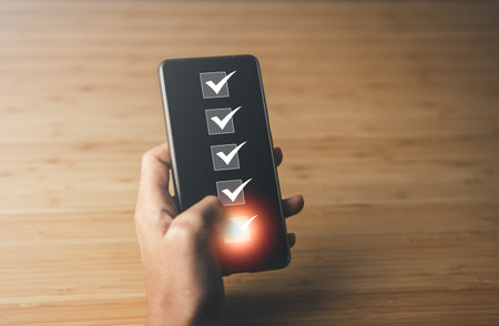 Businessman checking mark the check box. questionnaire and business concept.の写真素材